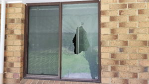 right side window is broken and shattered leaving a large hole